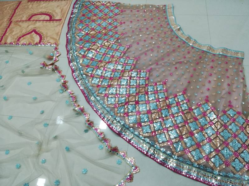 Attractive Multicolored Cotton Thread Embroidered with paper mirror work net fabric Designer Lehenga choli designs