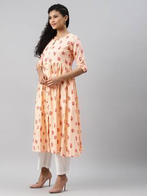 women peach cotton floral printed a-line kurta 3
