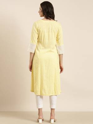 women's calf length round neck yellow abstract a-line kurta 4