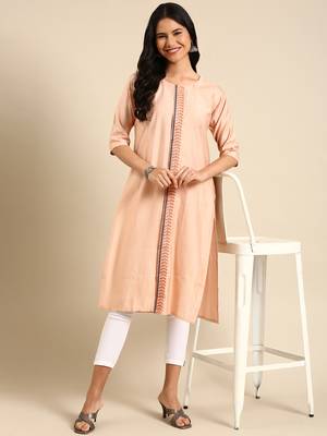 women's calf length round neck peach solid straight kurta 1