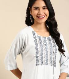 women's calf length round neck blue woven design straight kurta