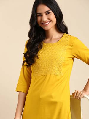 women's calf length round neck yellow solid straight kurta 1