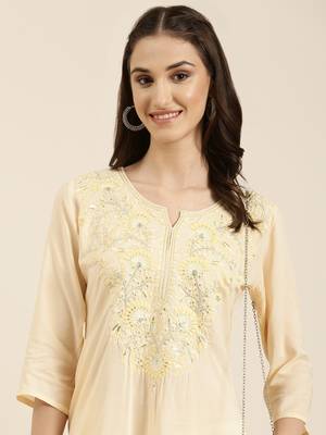 women's calf length round neck peach solid straight kurta 1