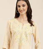 women's calf length round neck peach solid straight kurta