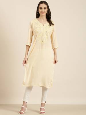women's calf length round neck peach solid straight kurta 2
