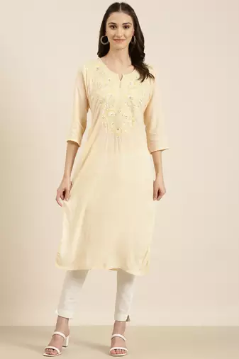 women's calf length round neck peach solid straight kurta