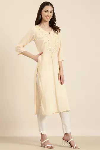 women's calf length round neck peach solid straight kurta