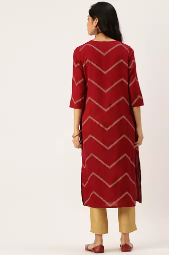 Showoff women's calf length round neck maroon solid straight kurta