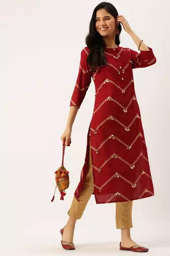 Showoff women's calf length round neck maroon solid straight kurta