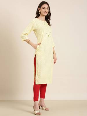 women's calf length tie-up neck yellow geometric straight kurta 4