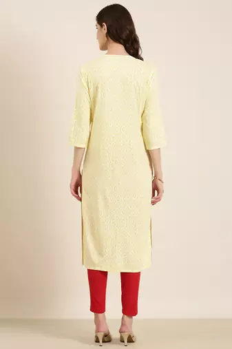 women's calf length tie-up neck yellow geometric straight kurta
