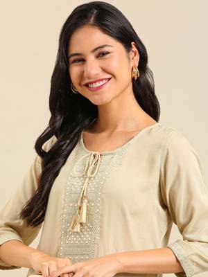 women's calf length round neck cream solid straight kurta 1