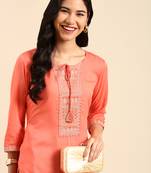 Showoff women's calf length round neck peach solid straight kurta