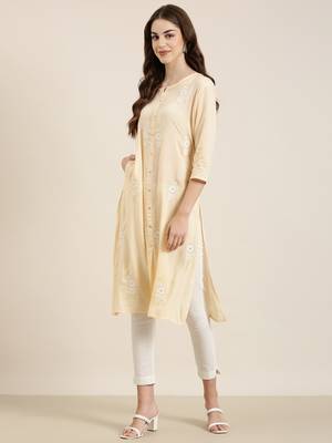 women's calf length round neck peach floral a-line kurta 4