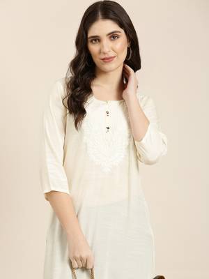 women's calf length round neck cream solid straight kurta 1