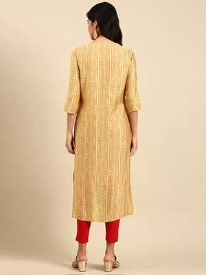 women's calf length round neck mustard tribal straight kurta 4