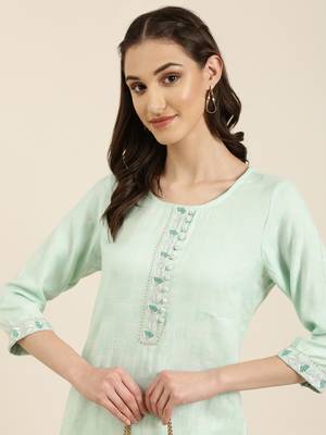 women's calf length round neck sea green woven design straight kurta 1