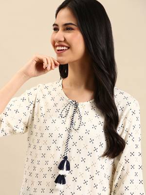 Showoff women's calf length round neck cream abstract straight kurta 1