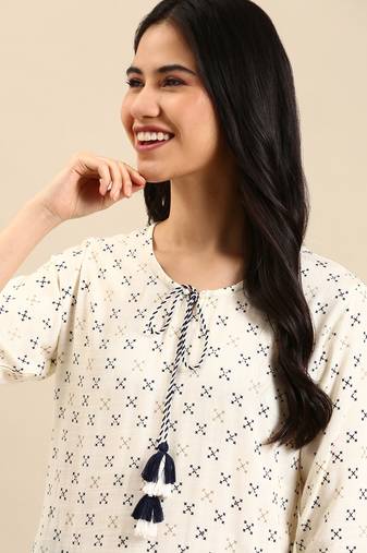 Showoff women's calf length round neck cream abstract straight kurta