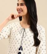Showoff women's calf length round neck cream abstract straight kurta