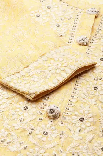 women's calf length mandarin collar yellow embellished straight kurta