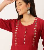 Showoff women's calf length round neck maroon solid straight kurta