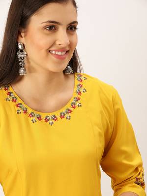 women's calf length round neck mustard solid straight kurta 1