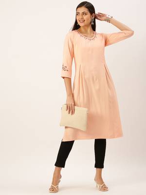 Showoff women's calf length round neck peach solid straight kurta 1