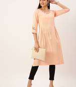 Showoff women's calf length round neck peach solid straight kurta