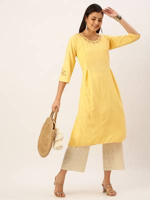 women's calf length round neck yellow solid straight kurta 1