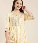 women's calf length round neck yellow woven design straight kurta
