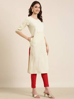 women's calf length round neck cream solid straight kurta 4