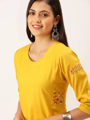 women's calf length round neck yellow solid straight kurta 1
