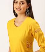 women's calf length round neck yellow solid straight kurta