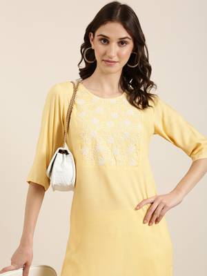 women's calf length round neck yellow solid straight kurta 1