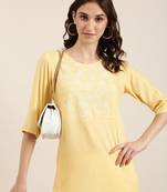 women's calf length round neck yellow solid straight kurta
