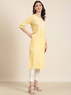 women's calf length round neck yellow solid straight kurta 4