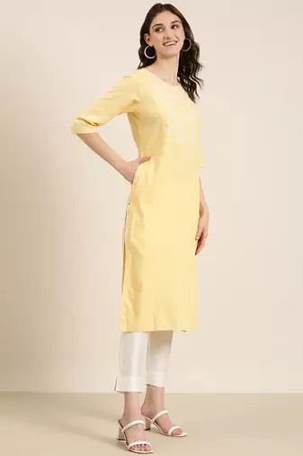 women's calf length round neck yellow solid straight kurta