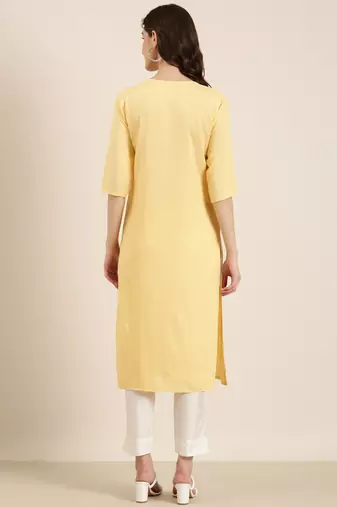 women's calf length round neck yellow solid straight kurta