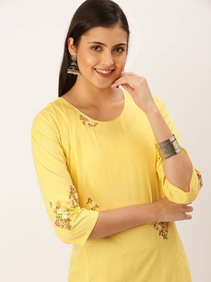 women's calf length round neck yellow solid straight kurta 1