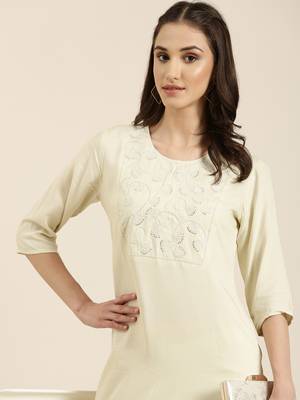 women's calf length round neck cream solid straight kurta 1
