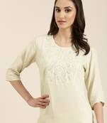 women's calf length round neck cream solid straight kurta