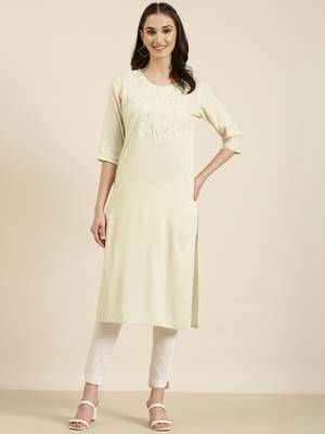 women's calf length round neck cream solid straight kurta 2