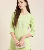women's calf length round neck lime green solid straight kurta