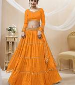 Enchanting Yellow Laheriya Print Georgette Designer Lehenga Choli