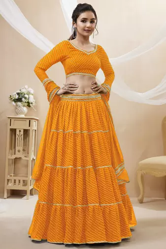 Enchanting Yellow Laheriya Print Georgette Designer Lehenga Choli