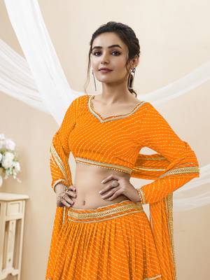Enchanting Yellow Laheriya Print Georgette Designer Lehenga Choli 4