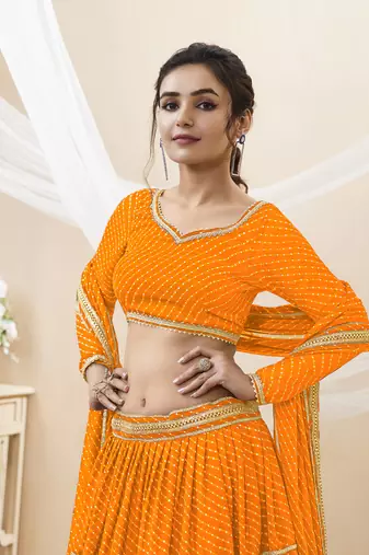 Enchanting Yellow Laheriya Print Georgette Designer Lehenga Choli
