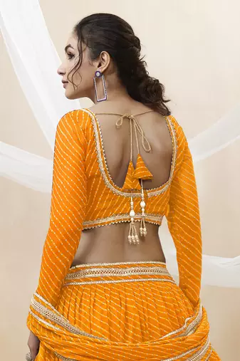 Enchanting Yellow Laheriya Print Georgette Designer Lehenga Choli