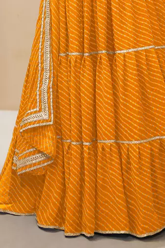 Enchanting Yellow Laheriya Print Georgette Designer Lehenga Choli
